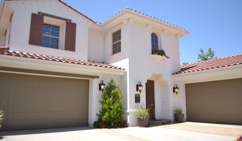 Carriage House Doors vs. Traditional Garage Doors