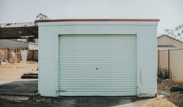 Noisy Garage Door? 3 Signs Your Garage Door Needs Springs Adjustment