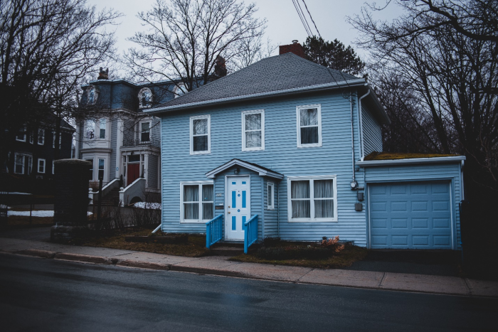 a house with a blue garage door