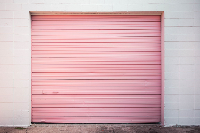a picture of a closed garage door from outside