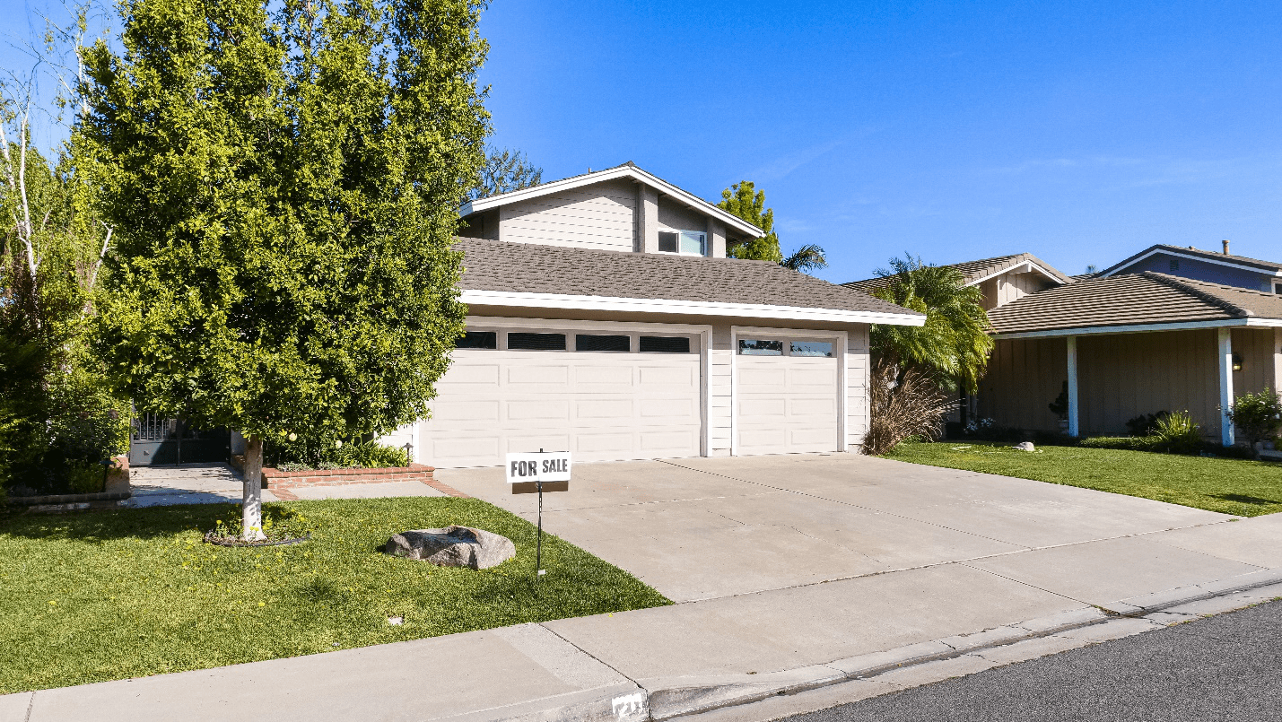 a house with a white garage door