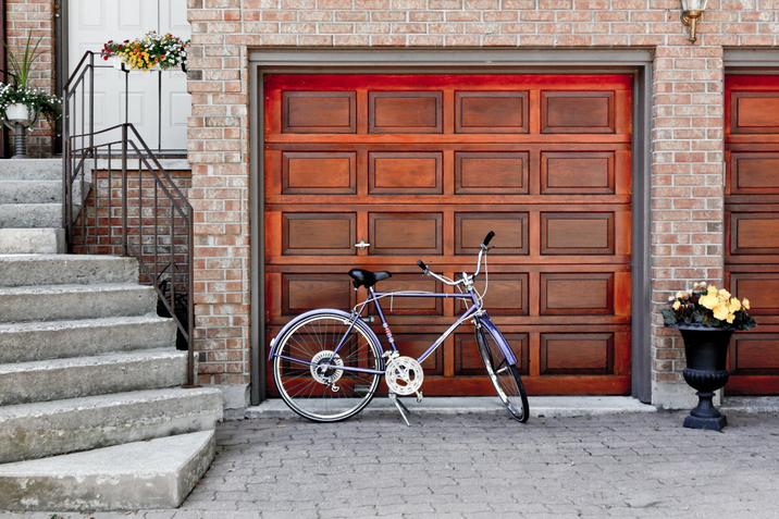 Bicycle Next to a Garage Door
