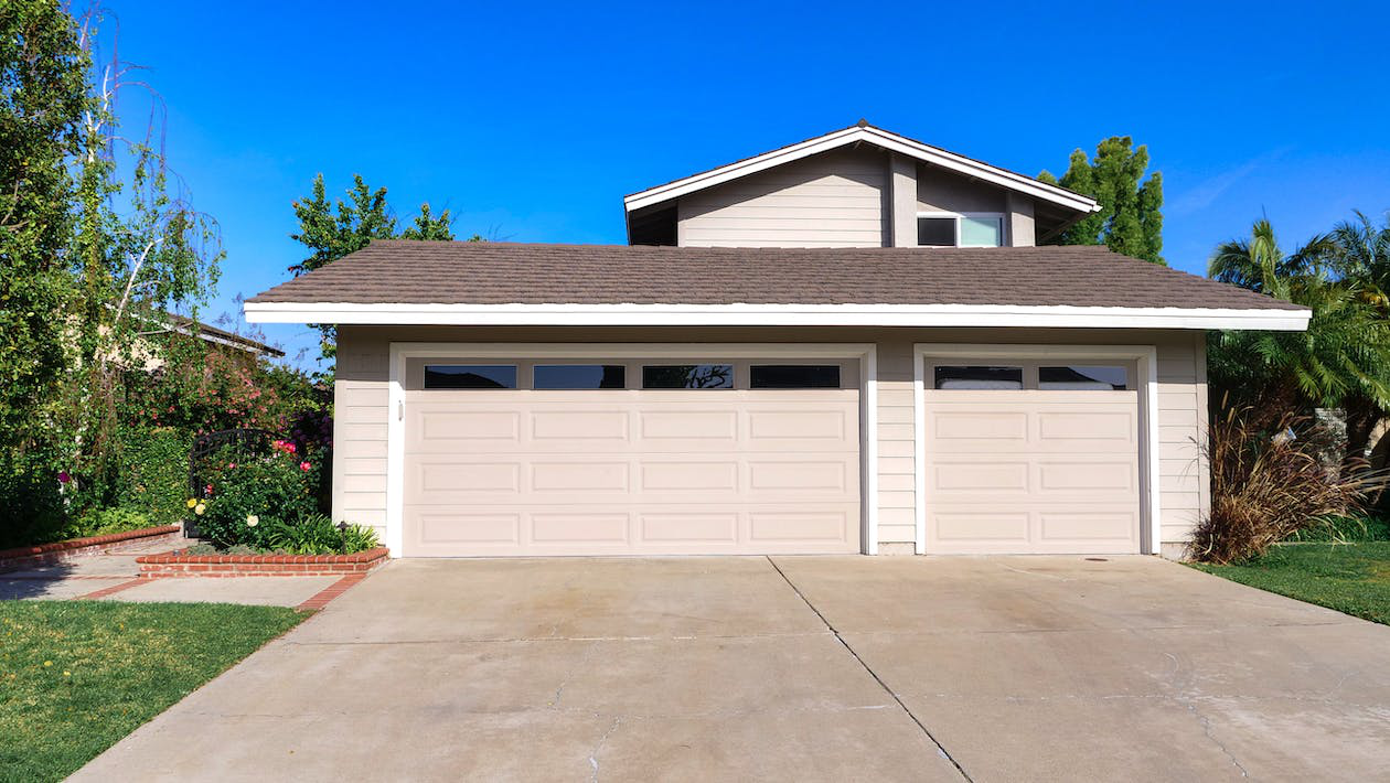 An image of two garage doors of a house