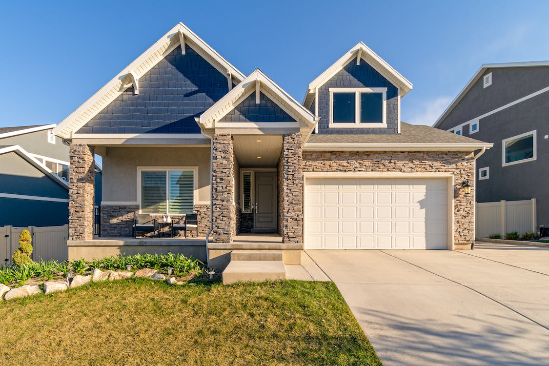 A beautiful house with a white garage